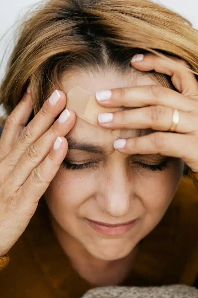 A Woman Suffering From Headache 